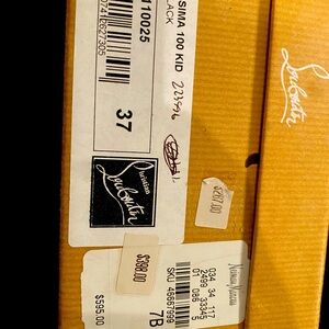 Christian Louboutin classic black pumps